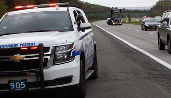 a policear pulled over onto the side of a road