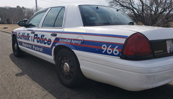 a police officer's car watching over traffic